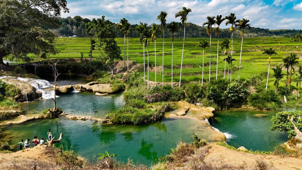 Traditional rice fields and natural pools in Sumba, Indonesia – a symbol of the island’s untouched nature and sustainable development.